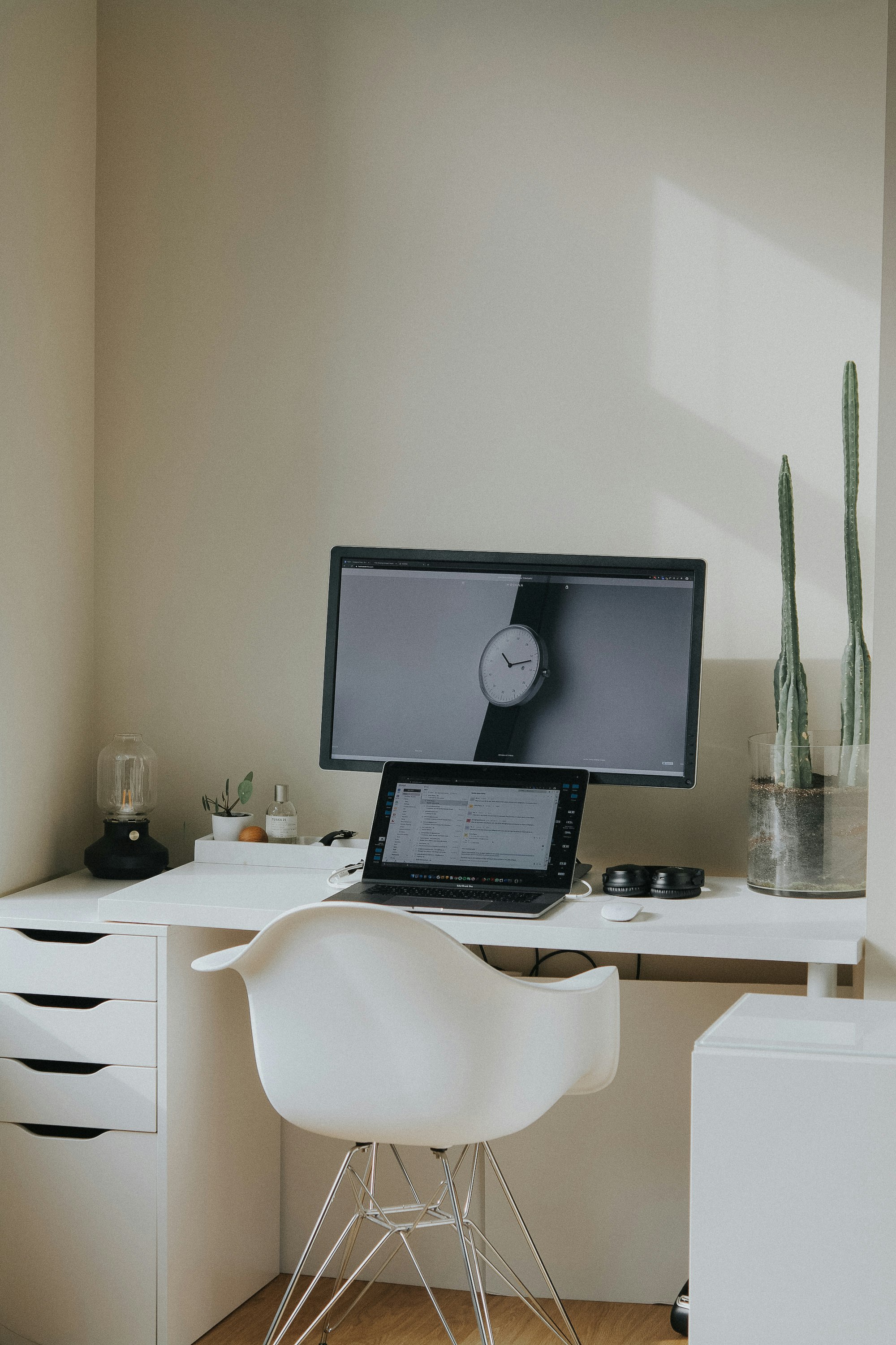 black laptop computer on white table